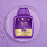شامپو ضدریزش و حجم دهنده بیوکسین BIOXCIN مدل کلاژن و بیوتین Collagen and Biotin حجم 300 میل